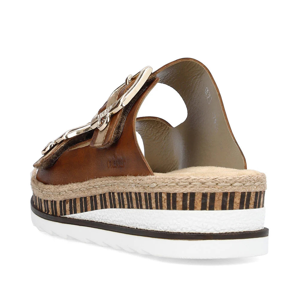 Brown sandal with a platform sole on a white background
