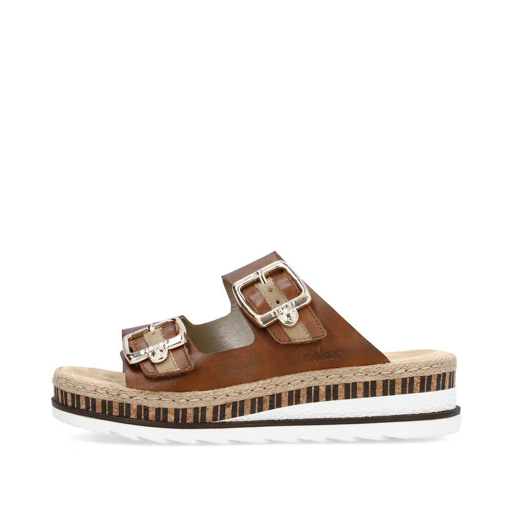 Brown sandal with two buckles on a white background