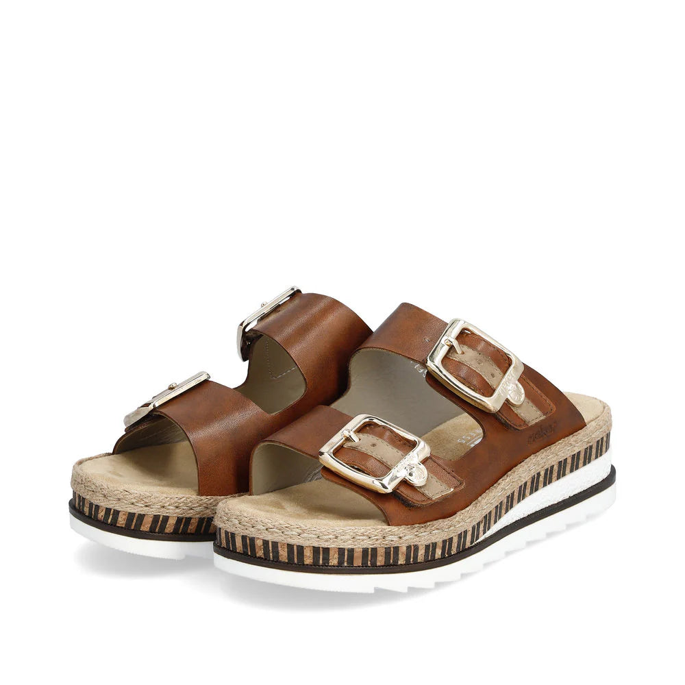 Brown sandals with buckles on a white background