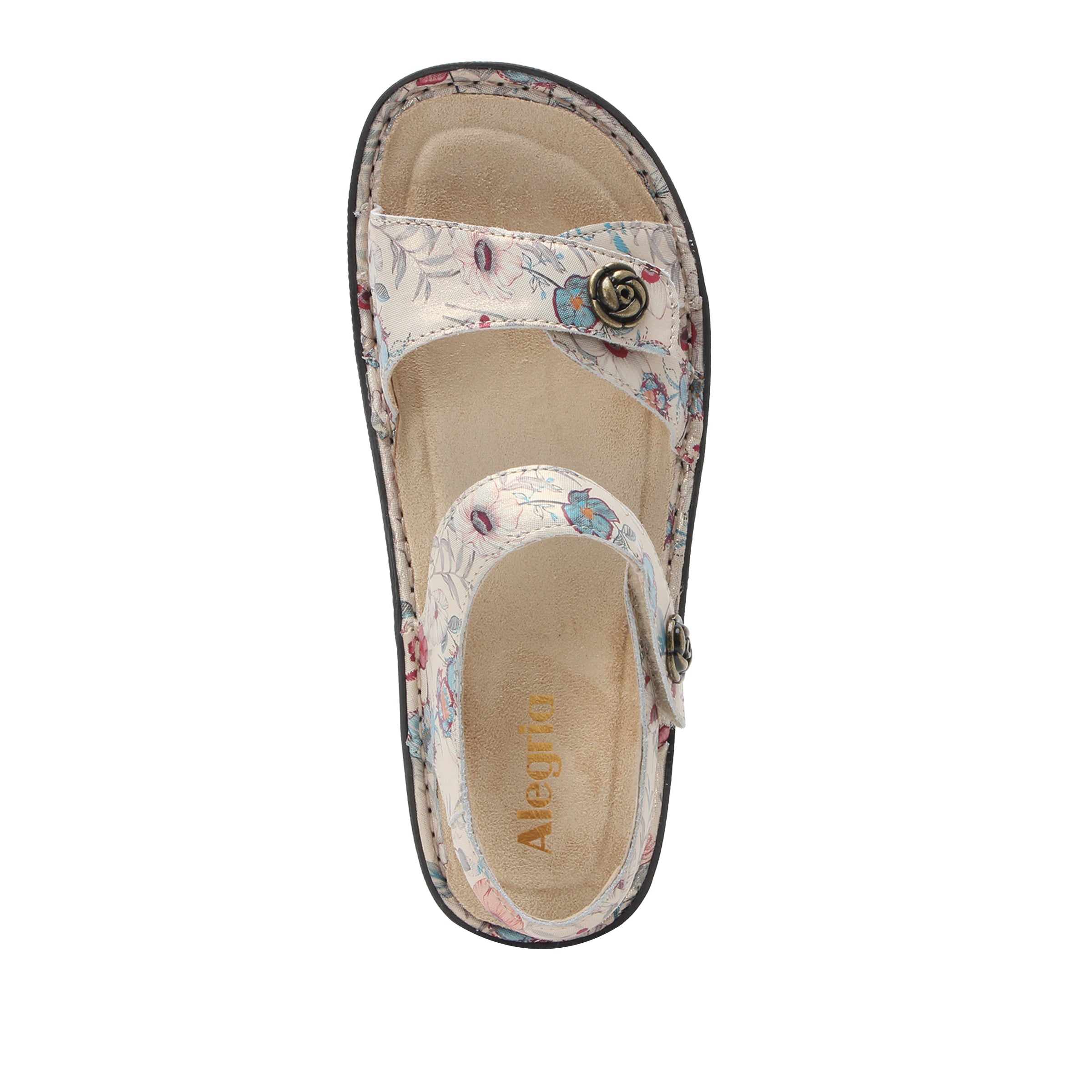 Floral sandal with a button detail on a white background