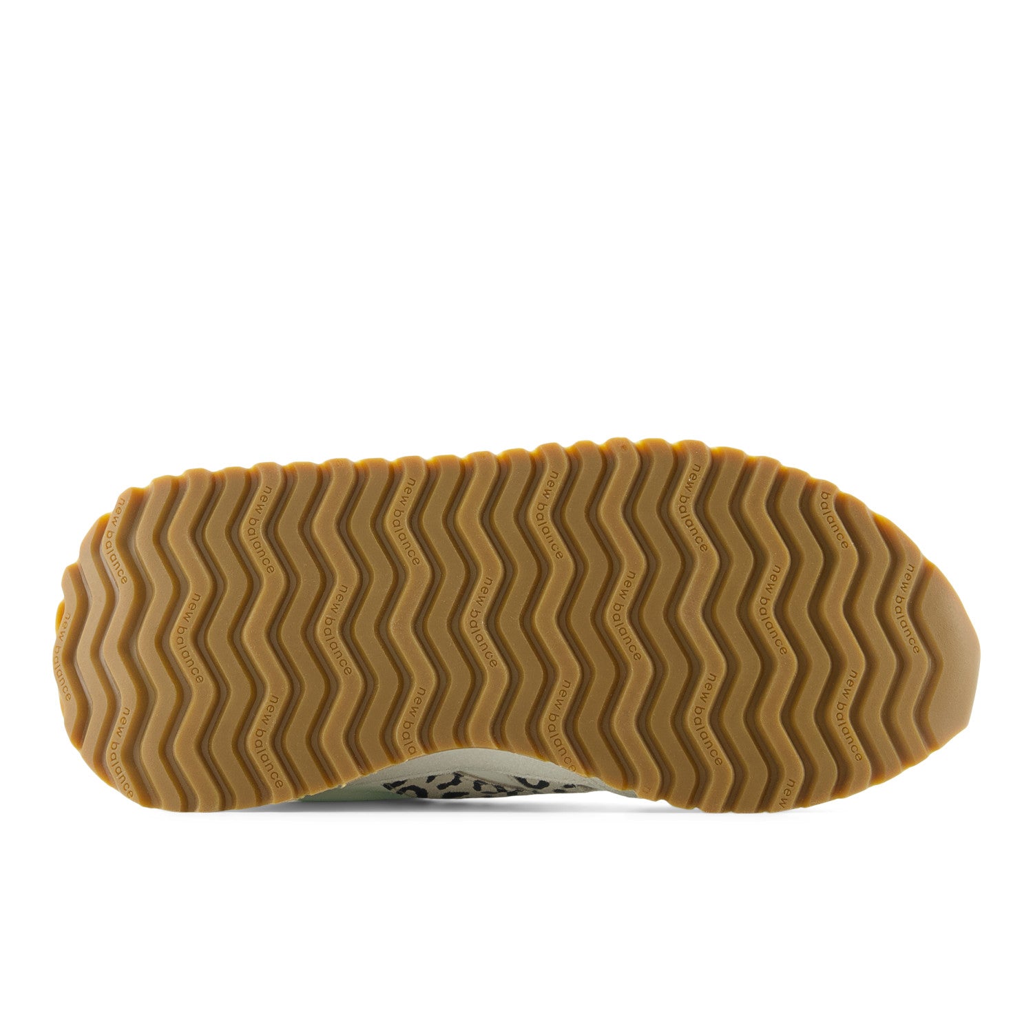 Close-up of a shoe sole with wavy tread pattern on a white background