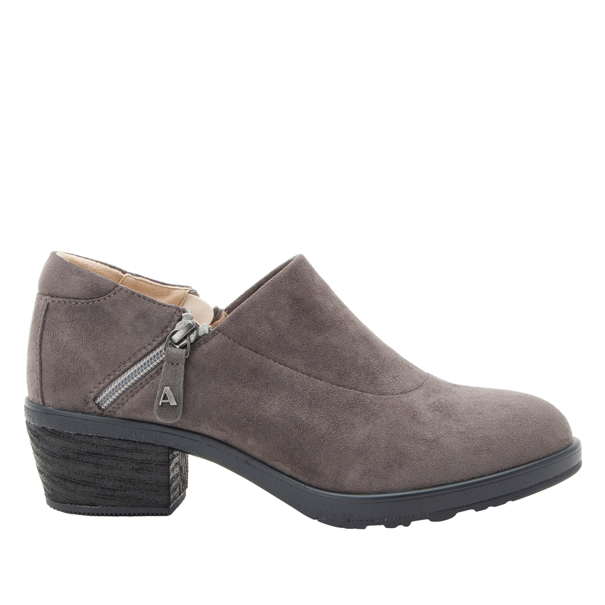 A single women's ankle boot in taupe-brown suede, featuring a low block heel, a side zipper with a silver pull tab, and a black sole, shown against a plain white background.
