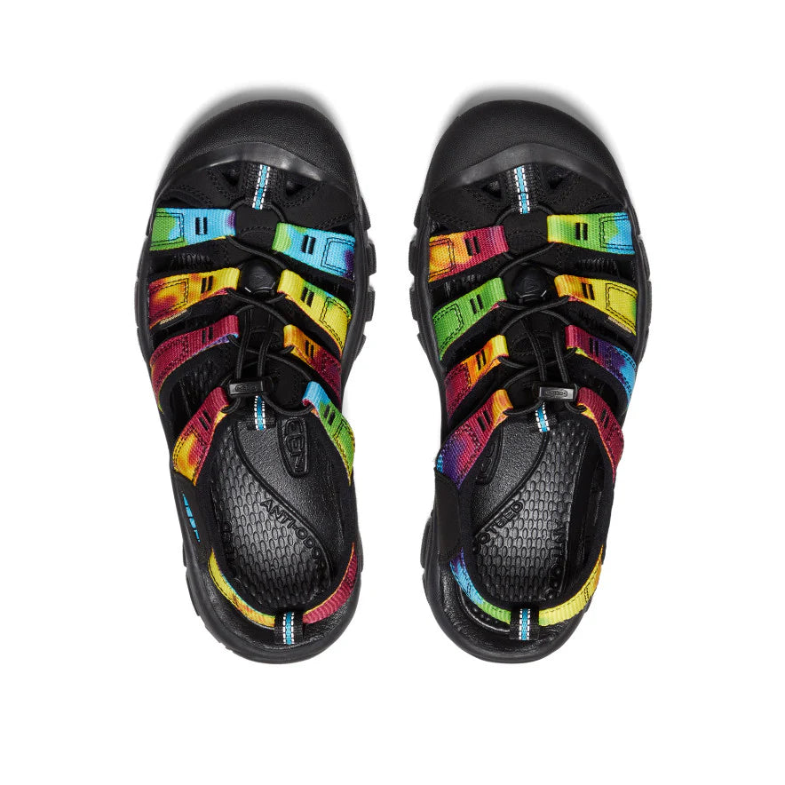 Black sandals with colorful straps on a white background
