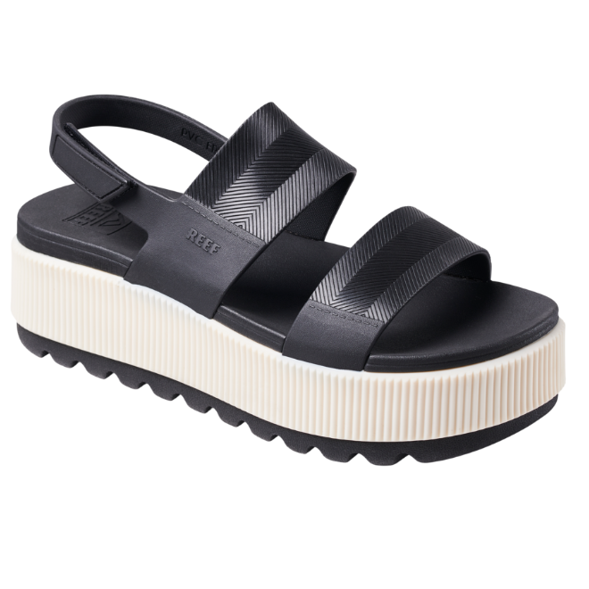 Black platform sandal with white sole on a white background