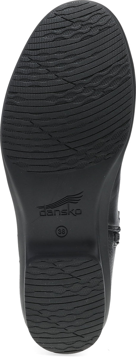 Black leather boot sole with a textured tread pattern and embossed 'dansk' brand logo.
