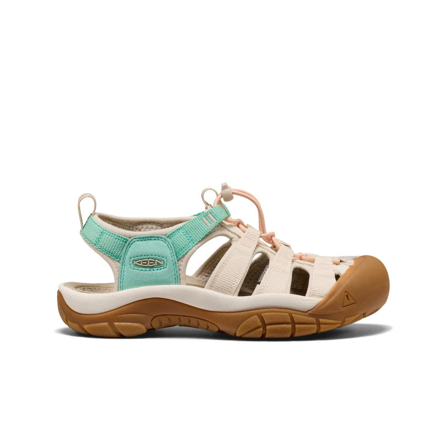 Sandal with turquoise straps and brown sole on a white background