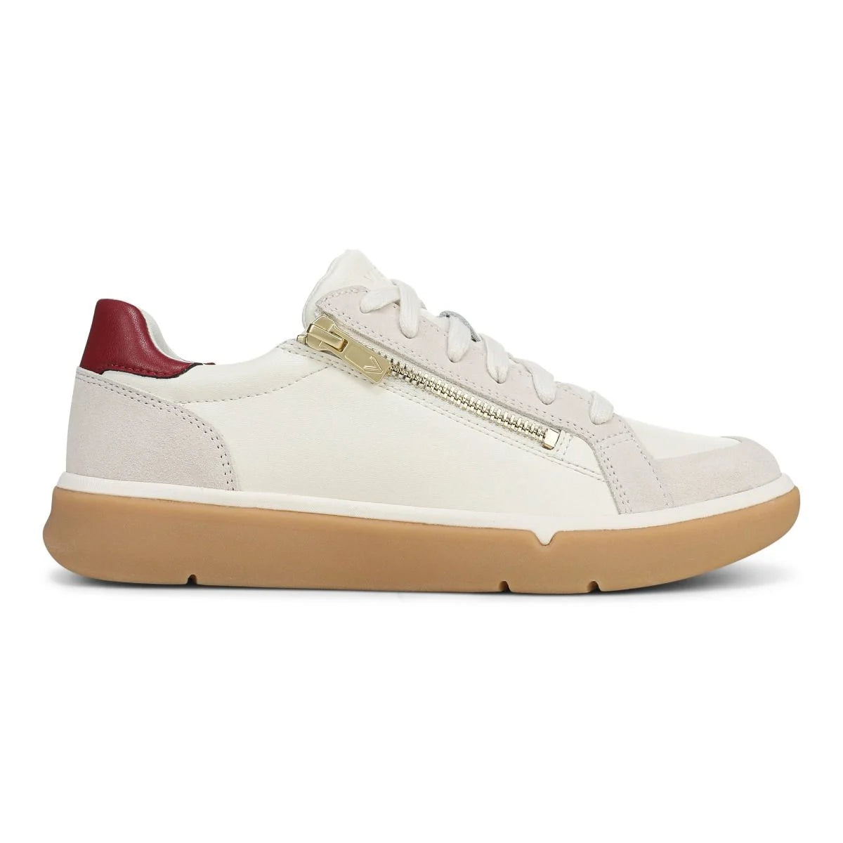 White sneaker with a gold zipper and red heel tab on a white background