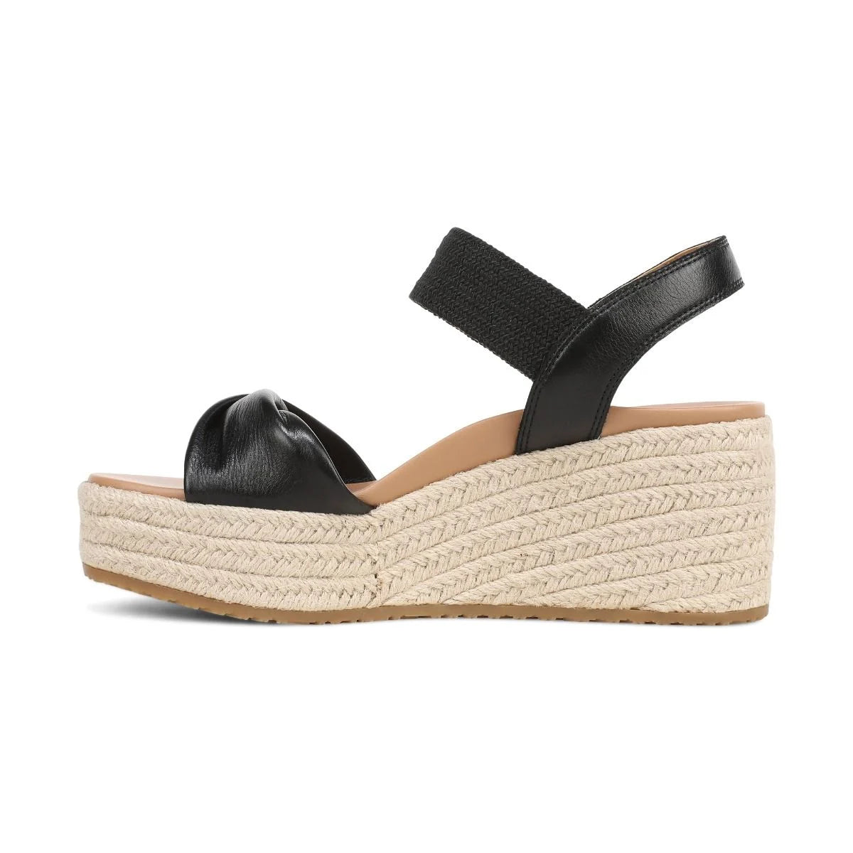 Black wedge sandal with espadrille sole on a white background