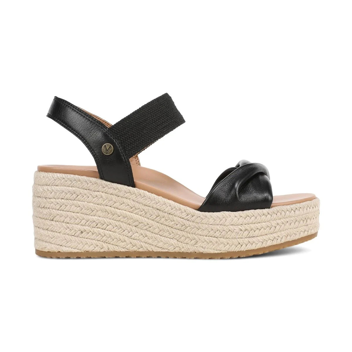 Black wedge sandal with espadrille sole on a white background