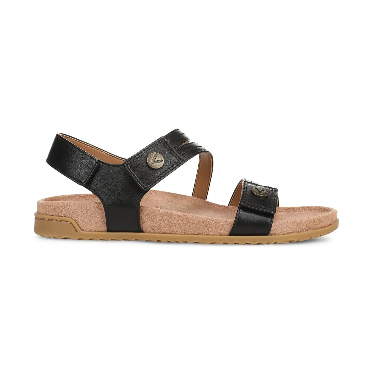Black sandal with tan sole on a white background