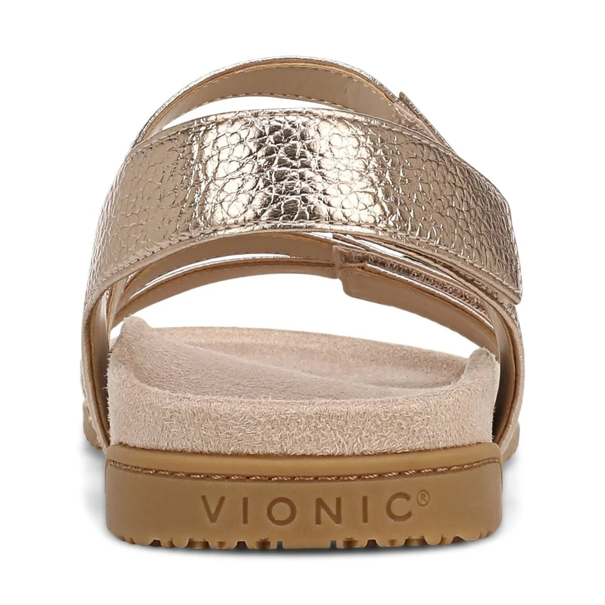 Gold sandal with 'Vionic' branding on a white background