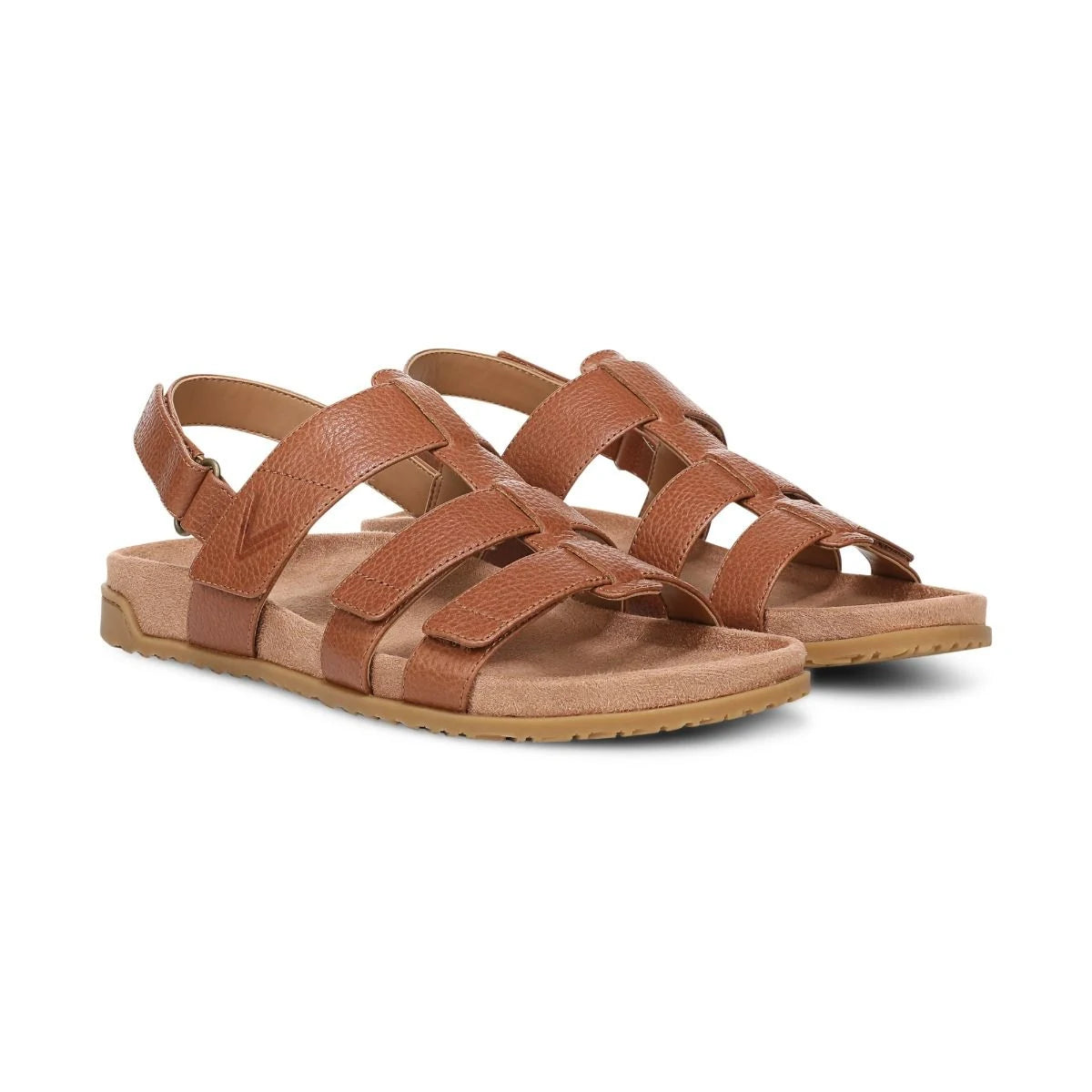 Pair of brown sandals on a white background