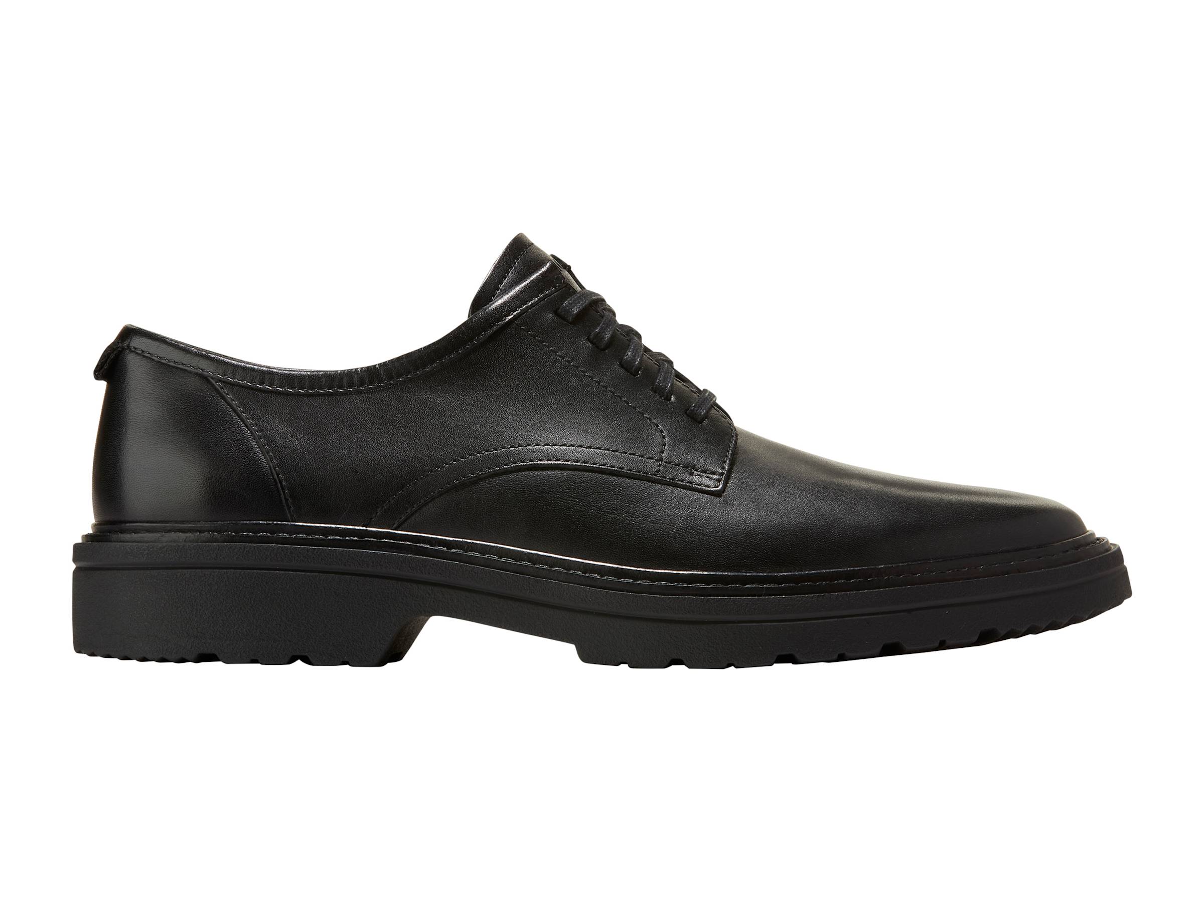Black patent leather shoe with gold accents on a white background