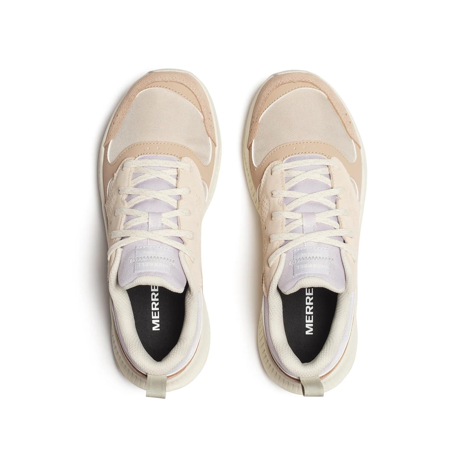 Pair of beige sneakers with white laces on a white background