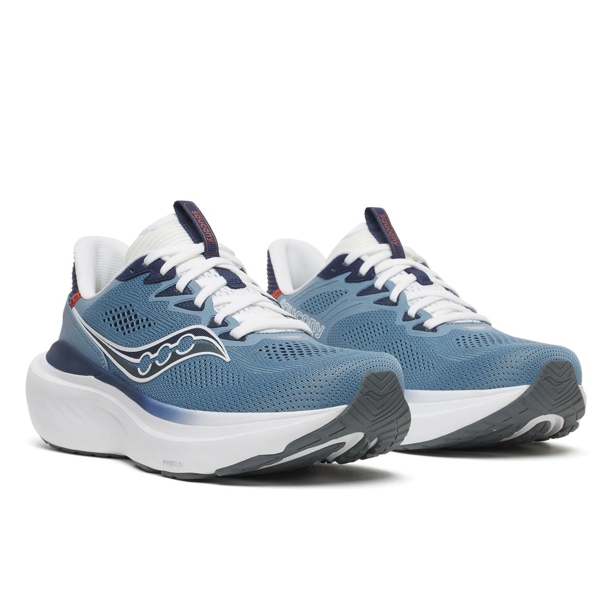 A pair of Saucony athletic sneakers in blue and white, featuring a breathable mesh upper, white laces, a thick white midsole, and a dark gray outsole, shown against a plain white background.