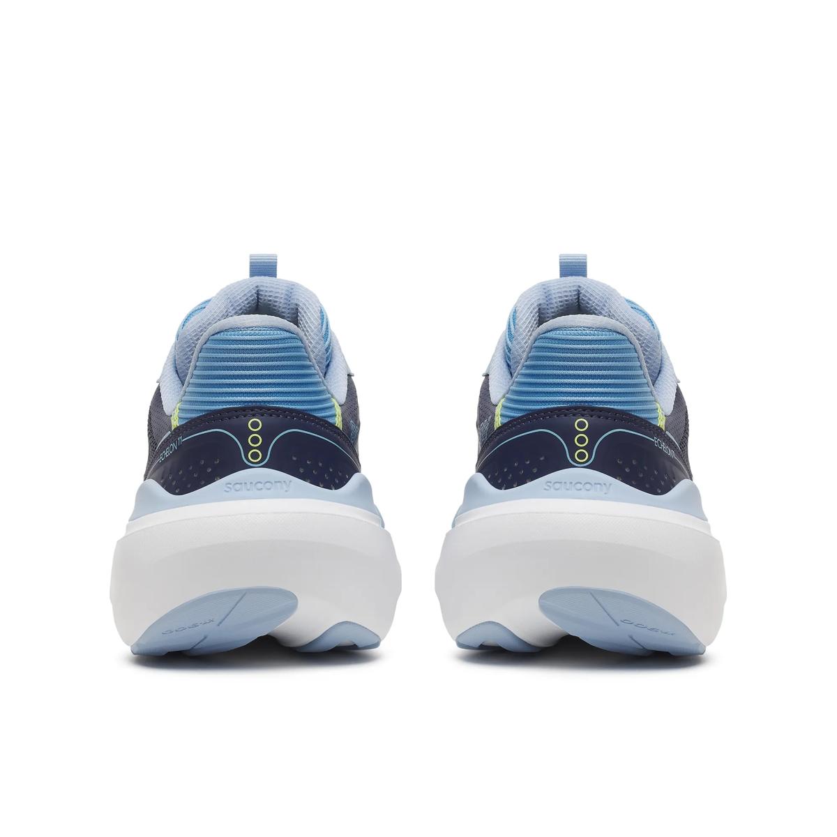 A pair of athletic sneakers shown from the back, featuring a navy blue and light blue upper with a thick white sole.