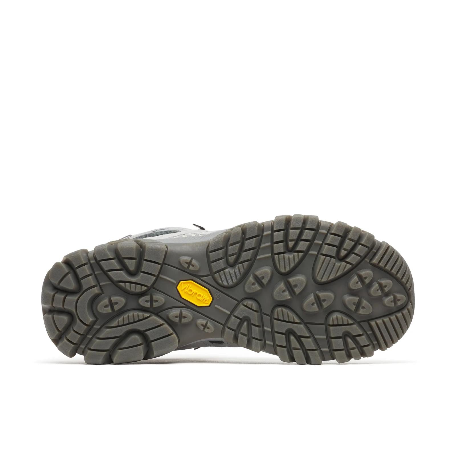 Close-up of a gray hiking boot sole with a yellow label on a white background