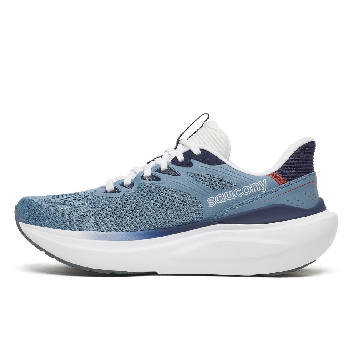 A Saucony athletic sneaker in blue and white, featuring a textured knit upper, white laces, a thick white midsole, and a dark navy heel counter, shown from a side profile on a white background.