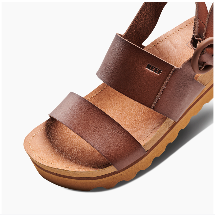 Brown sandal with multiple straps on a white background