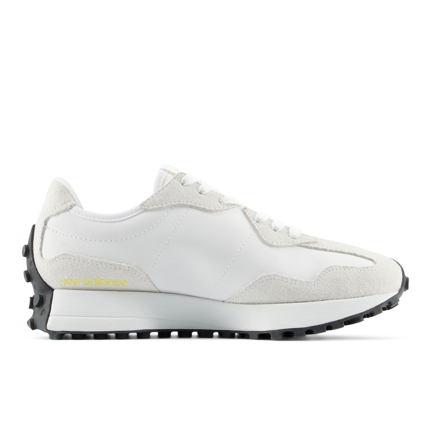 White sneaker with black sole on a white background