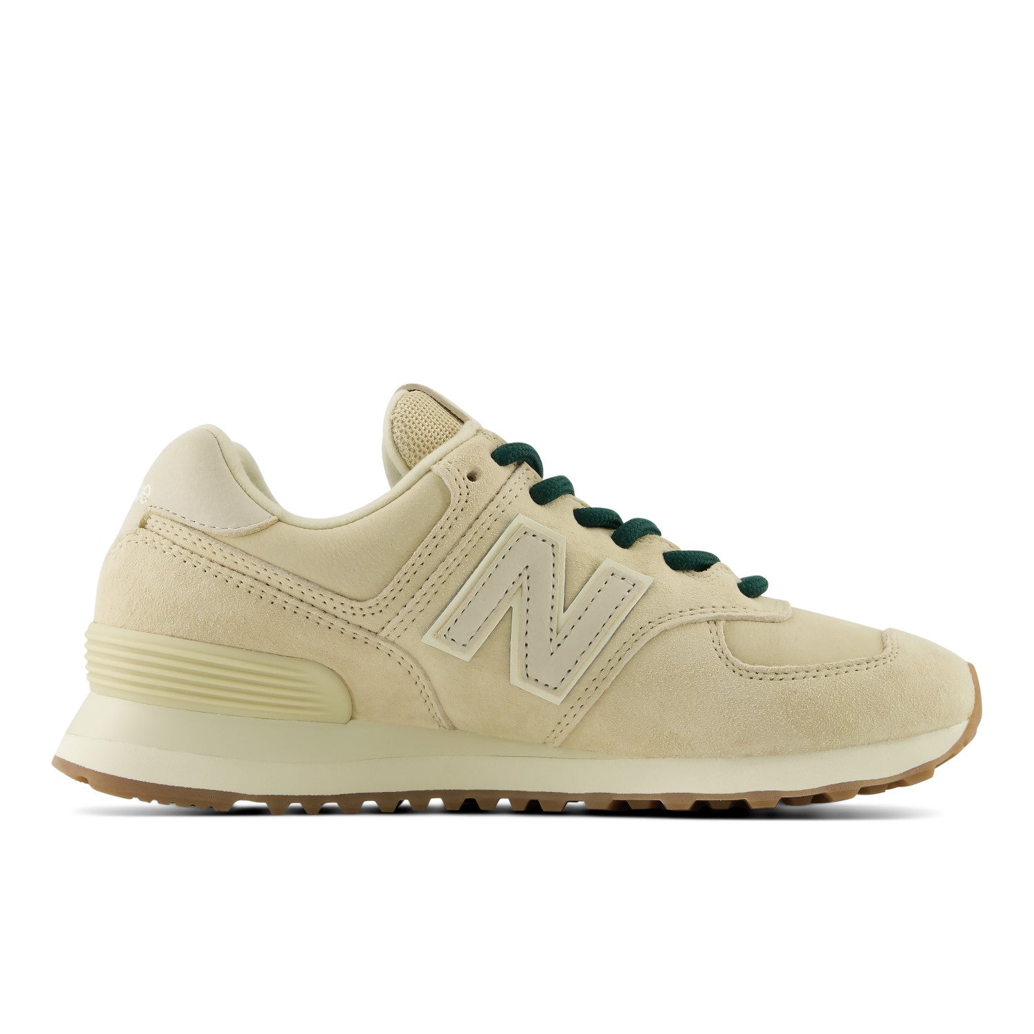 Beige sneaker with green laces on a white background