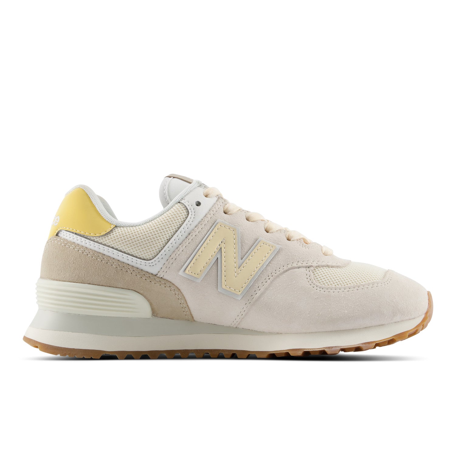 Beige sneaker with yellow accents on a white background
