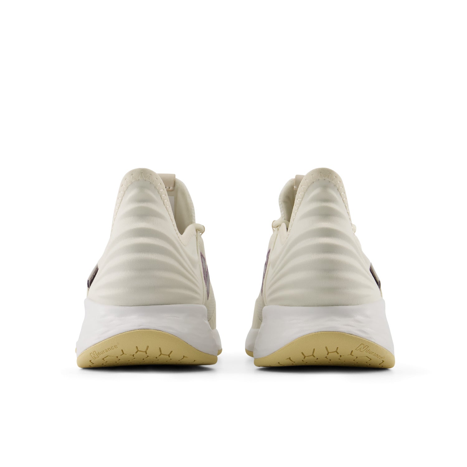 White sneakers with beige soles on a white background