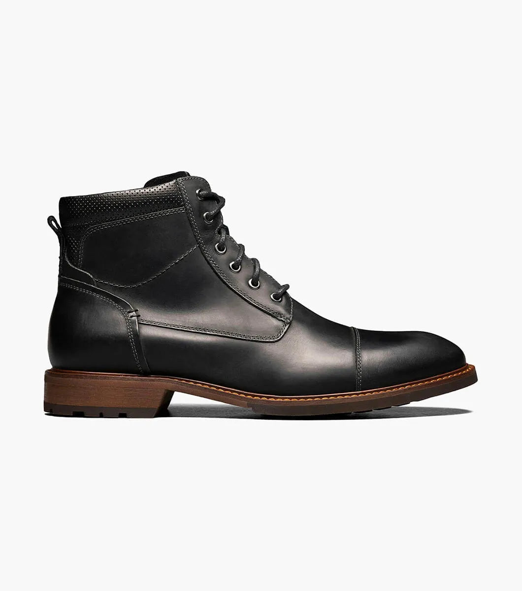 A black leather lace-up ankle boot with a brown stacked sole, shown in a side profile on a light gray background.