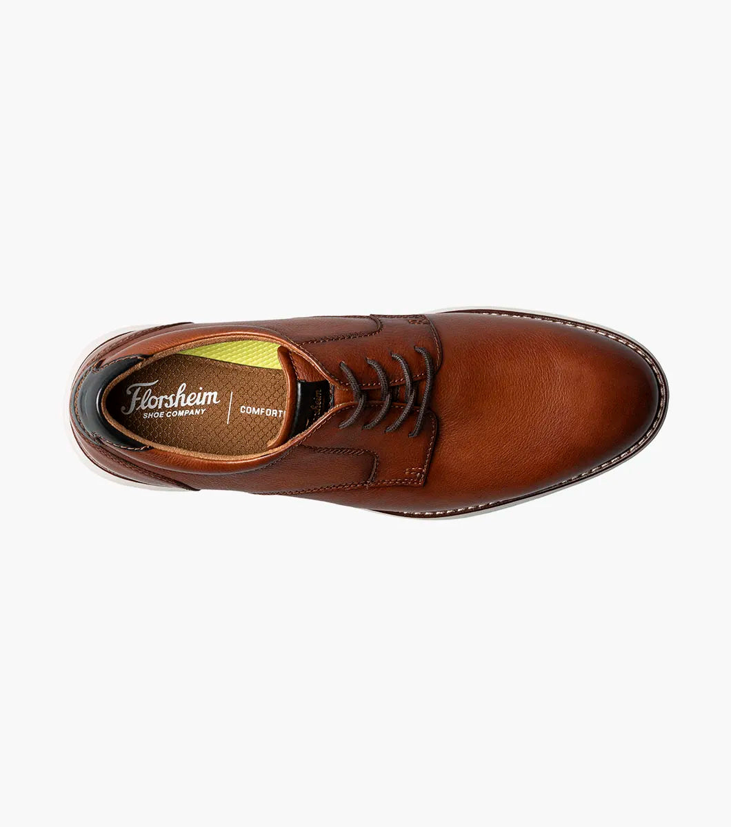 Brown leather dress shoe with Florsheim logo on a white background