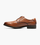 Brown leather dress shoe on a white background