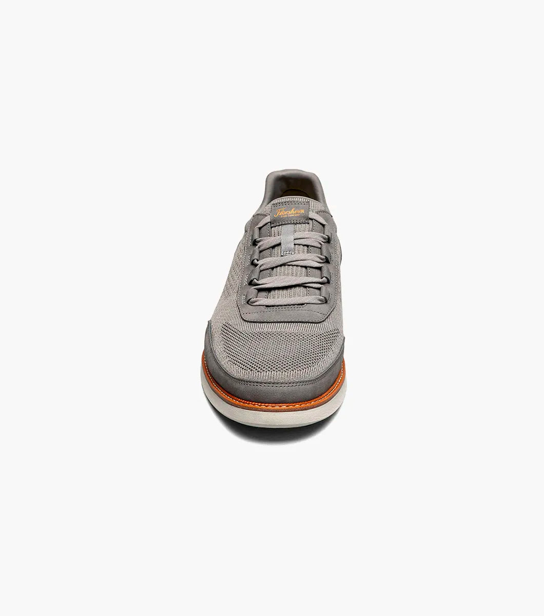 Gray sneaker on a white background