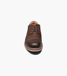 Brown leather shoe on a white background