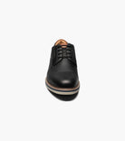 Black leather shoe on a white background
