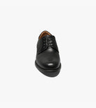 Black leather shoe on a white background