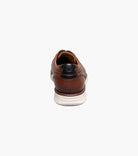 Brown leather shoe on a white background