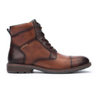 Brown leather boot with lace-up design on a white background