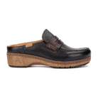 A black leather clog shoe with a brown leather strap detail and a thick brown cork-look platform sole, shown in a side profile on a white background.