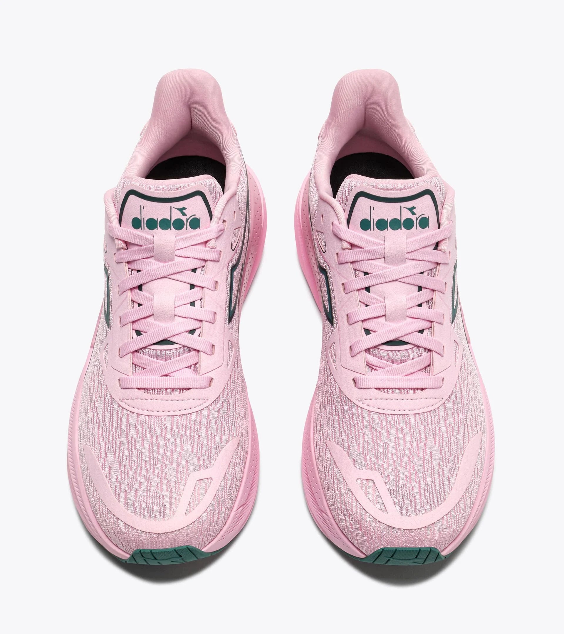 Pink running shoes with visible brand logo on a white background