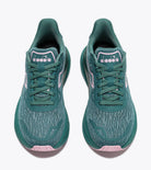 Teal running shoes with pink accents on a white background