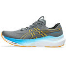Gray running shoe with blue sole on a white background