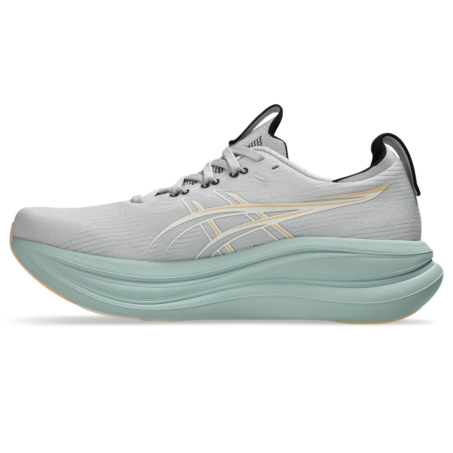 Gray running shoe with a light green sole on a white background