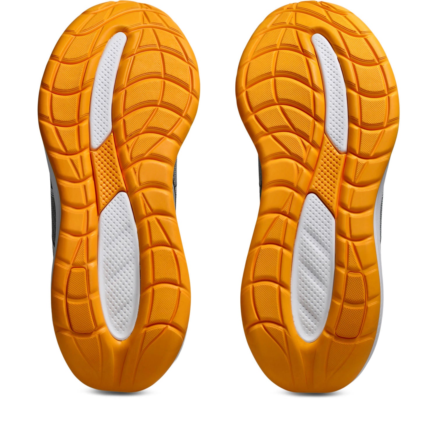 Orange and white sole of a shoe on a white background