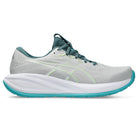 Gray running shoe with teal accents on a white background