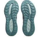 Teal and gray shoe soles on a white background