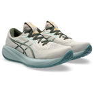 Pair of running shoes with a white and gray color scheme on a white background