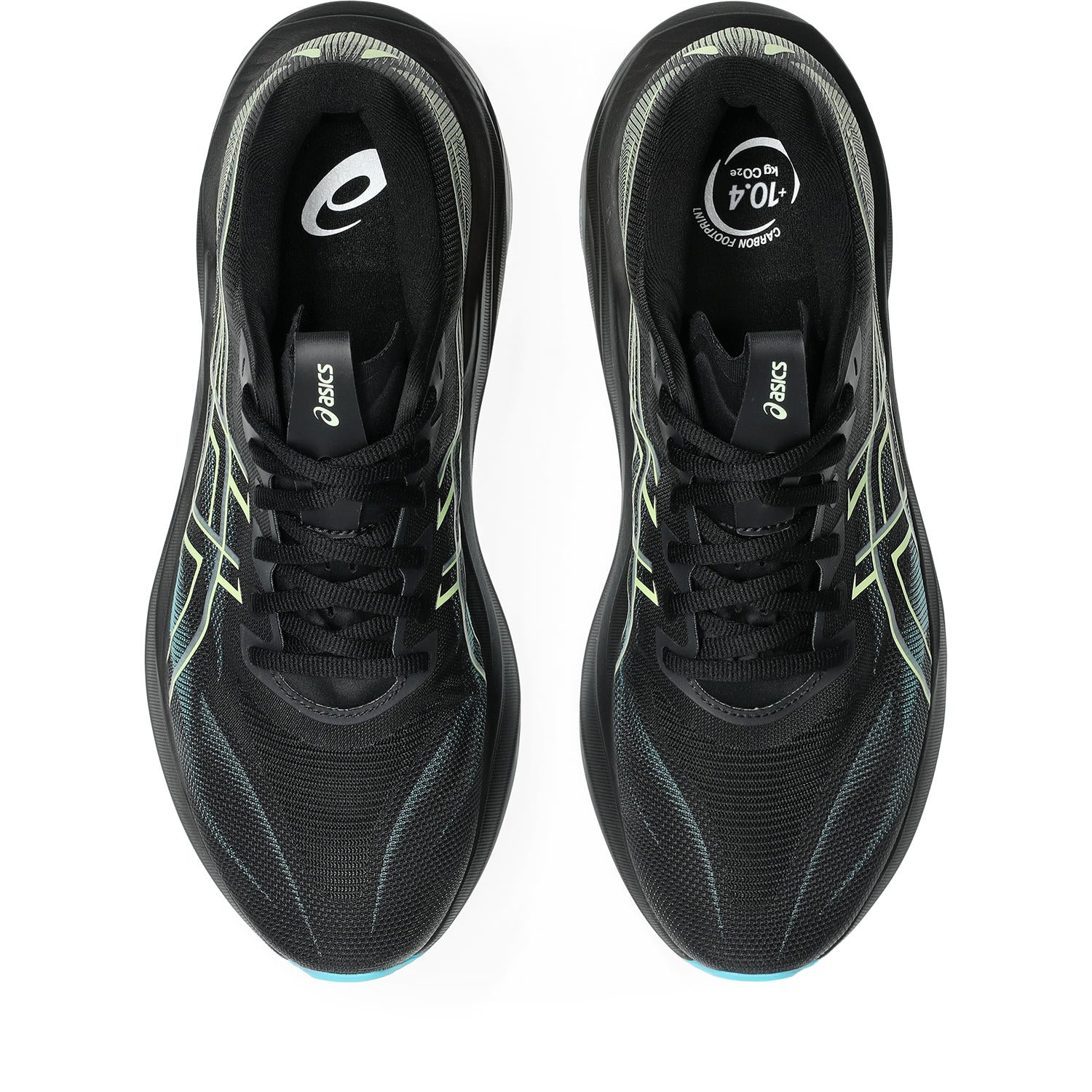 Black running shoes with green accents on a white background