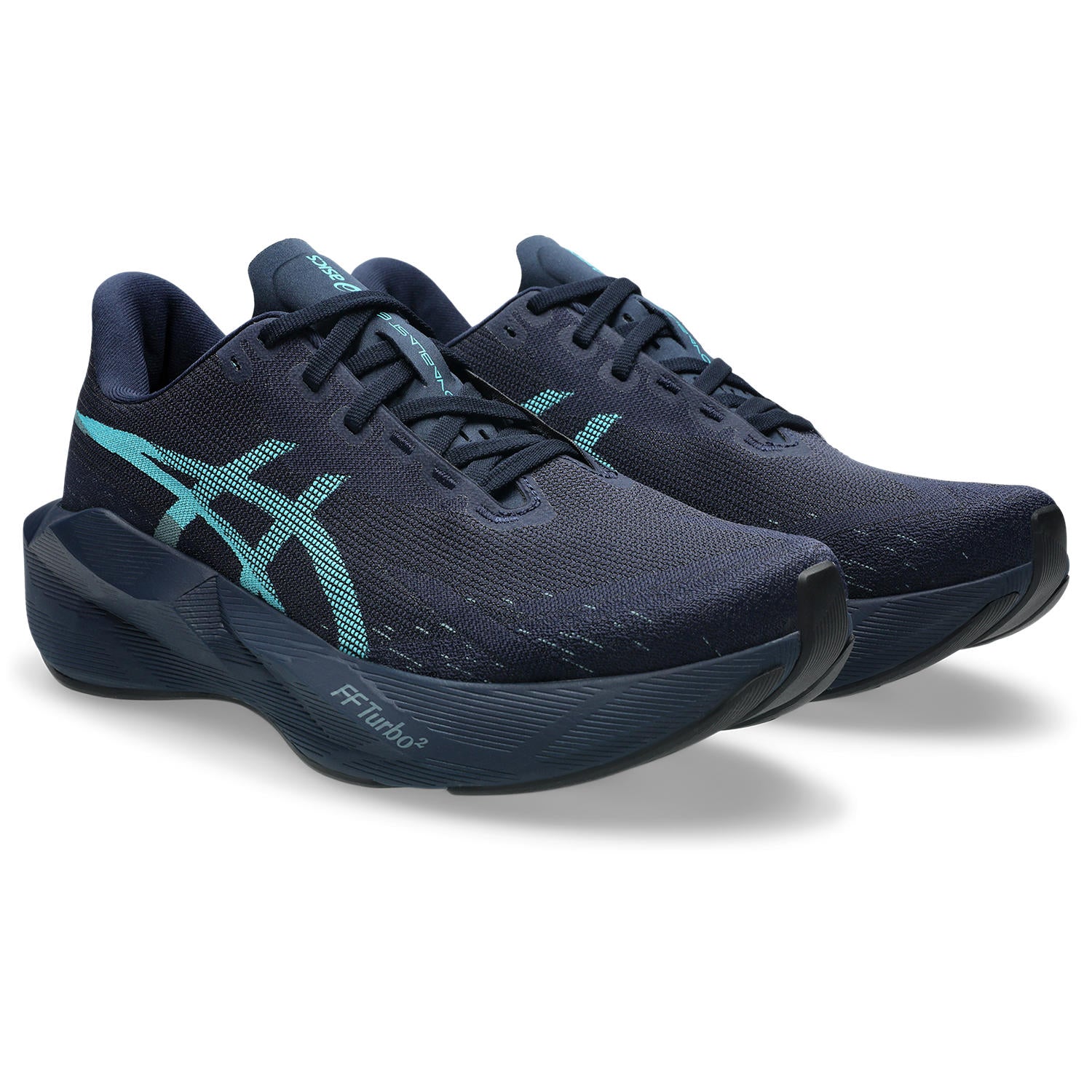 Navy running shoes with teal accents on a white background