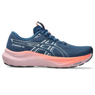 Blue and pink running shoe on a white background