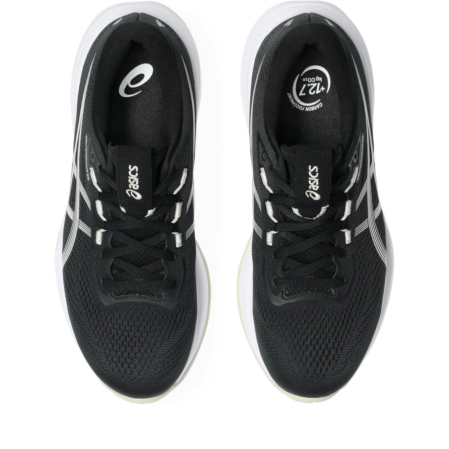 Black running shoes with white accents on a white background