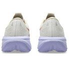 Pair of running shoes showing the sole on a white background